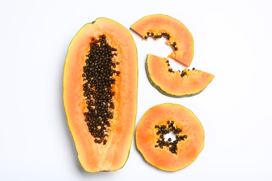 Fresh juicy cut papaya on white background, top view