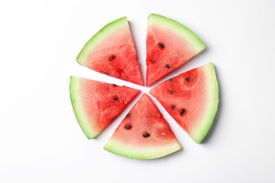 Flat lay composition with slices of watermelon on white background