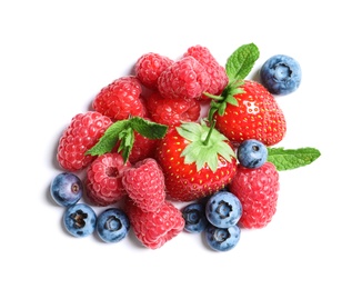 Photo of Raspberries, strawberries and blueberries on white background