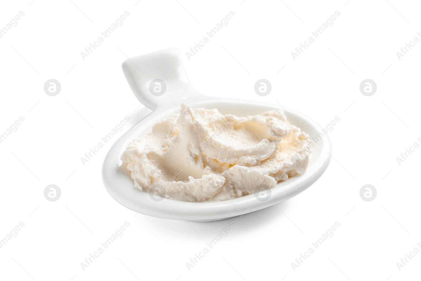 Photo of Serving spoon with tasty cream cheese on white background