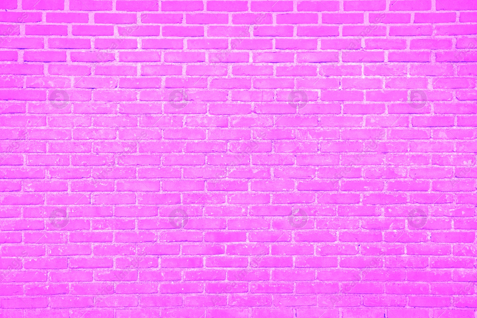 Image of Texture of bright fuchsia color brick wall as background