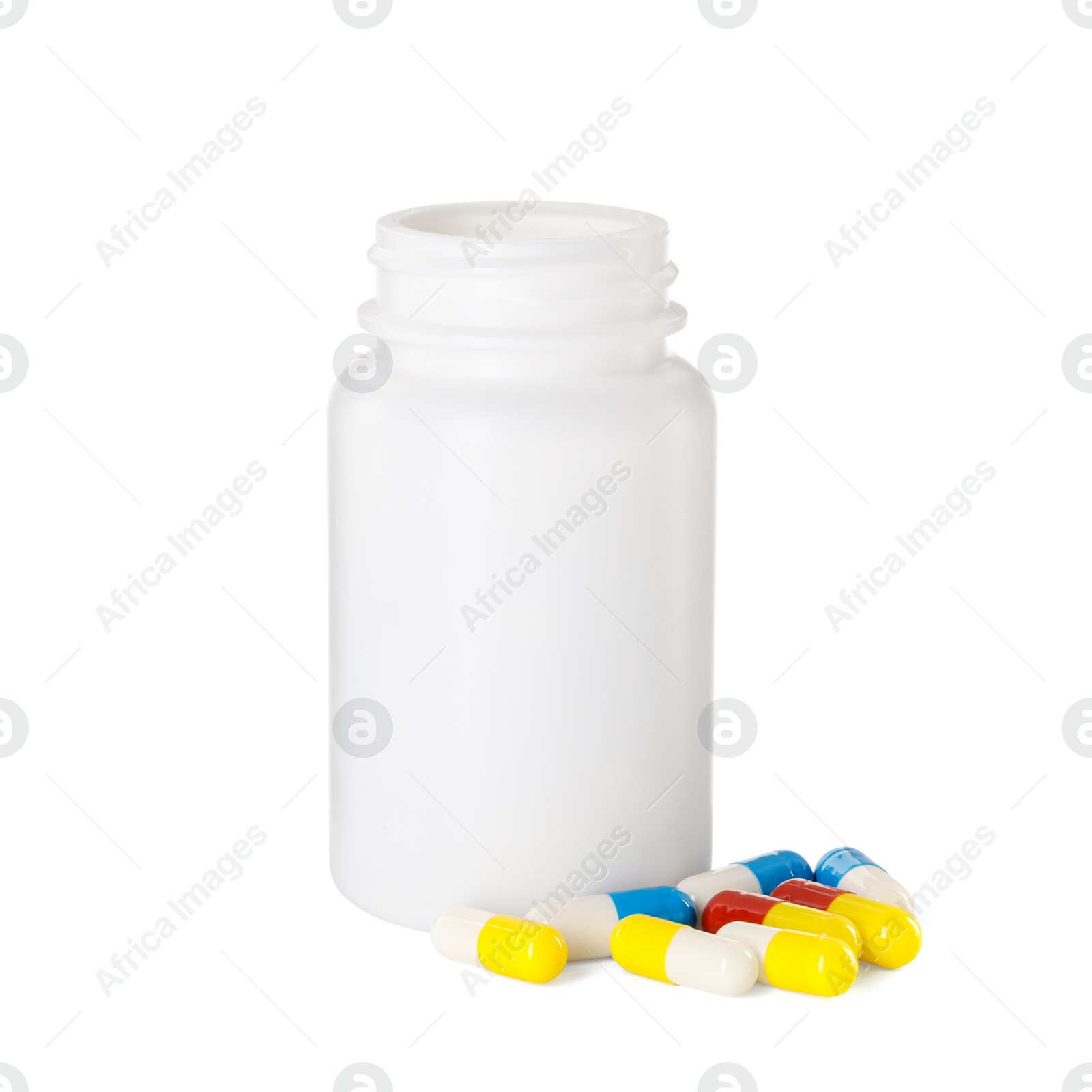 Photo of Antibiotic pills and bottle isolated on white