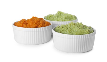 Photo of Different delicious puree in bowls on white background. Healthy food