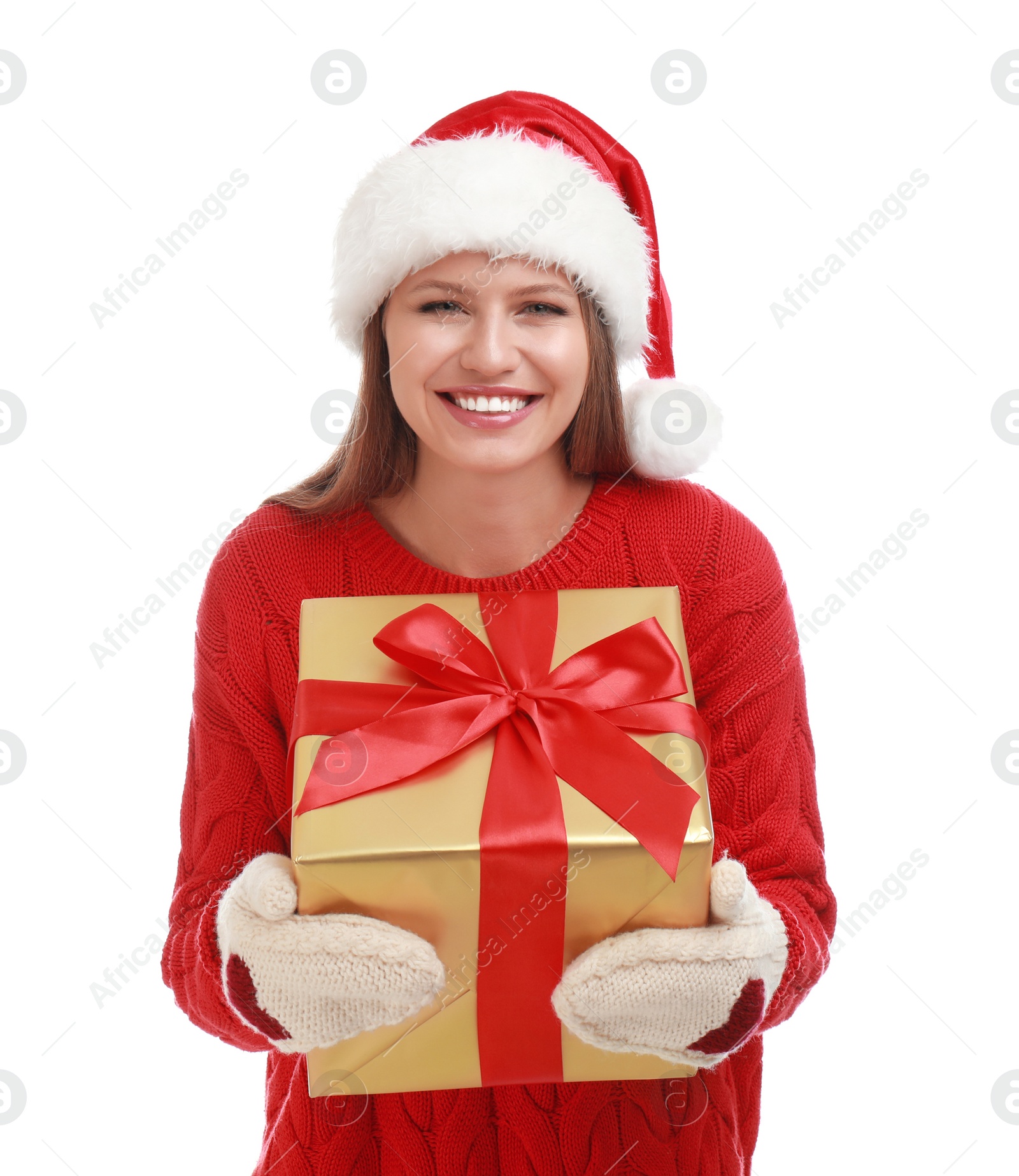 Photo of Happy young woman in Santa hat with Christmas gift on white background