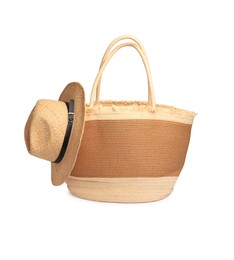 Photo of Stylish straw bag and hat isolated on white. Beach objects