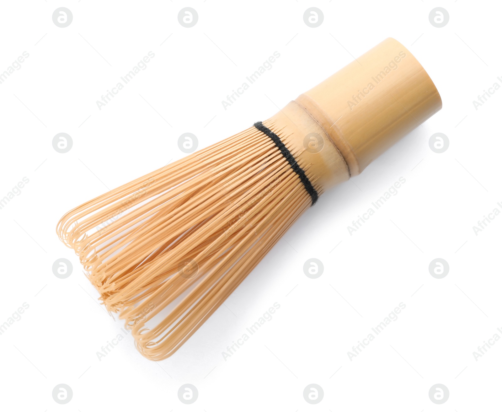 Photo of Tea whisk made of bamboo on white background, top view