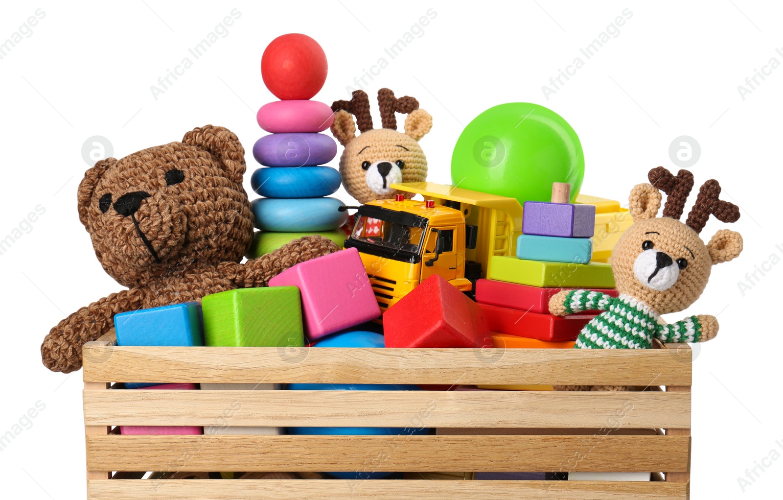 Photo of Many different children's toys in crate isolated on white