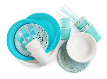 Photo of Set of different disposable tableware on white background, top view