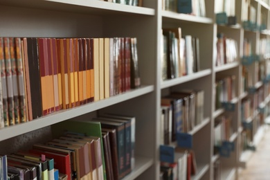 Photo of View of shelves with books in library