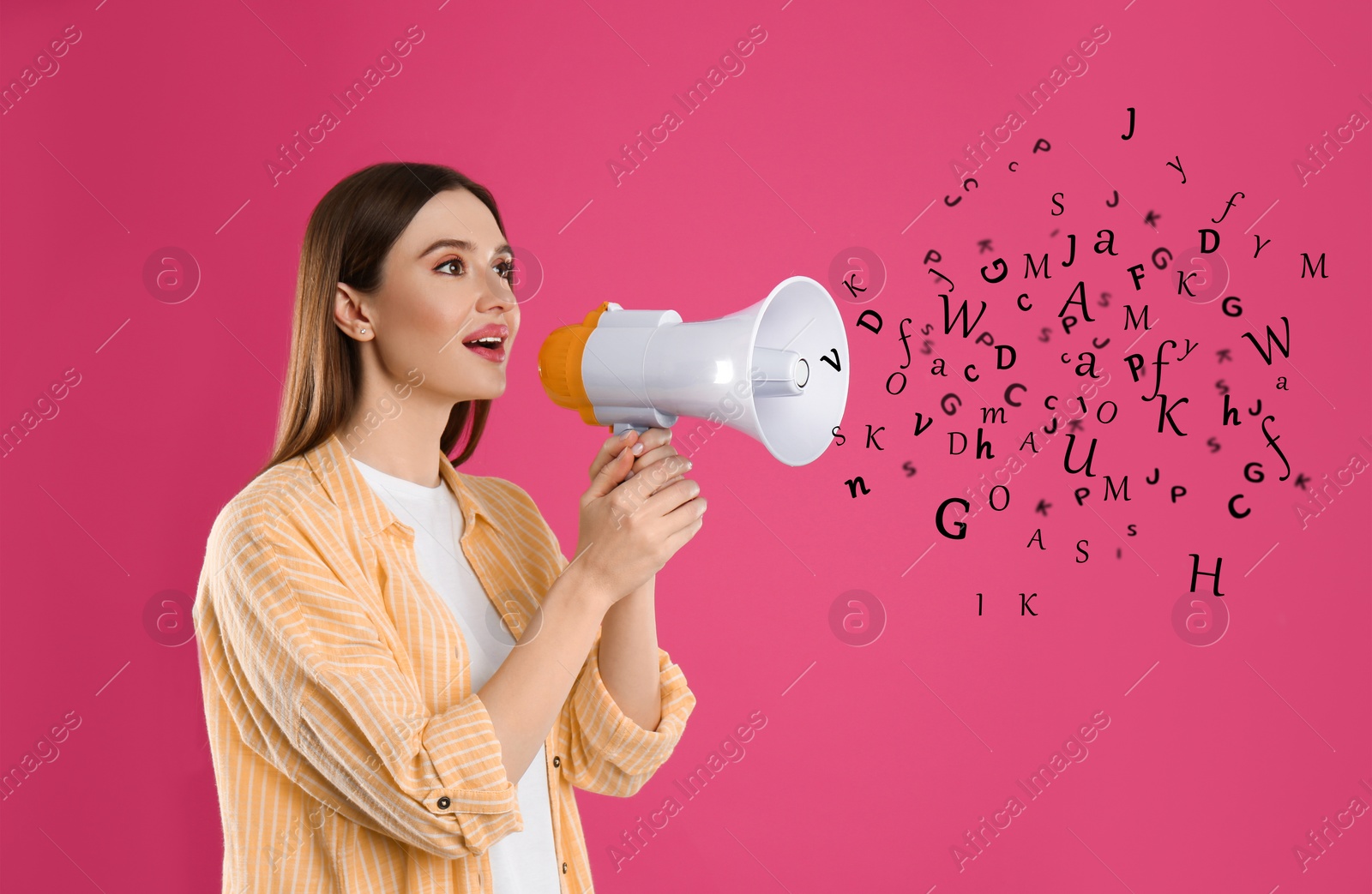 Image of Woman using megaphone on pink background. Letters flying out of device