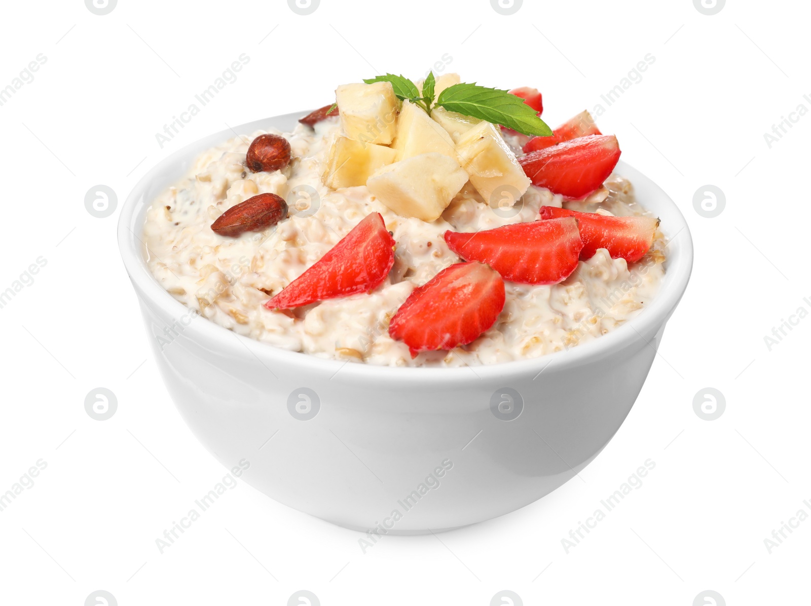 Photo of Tasty boiled oatmeal with strawberries, banana and almonds in bowl isolated on white