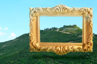 Image of Vintage frame and beautiful mountains under blue sky