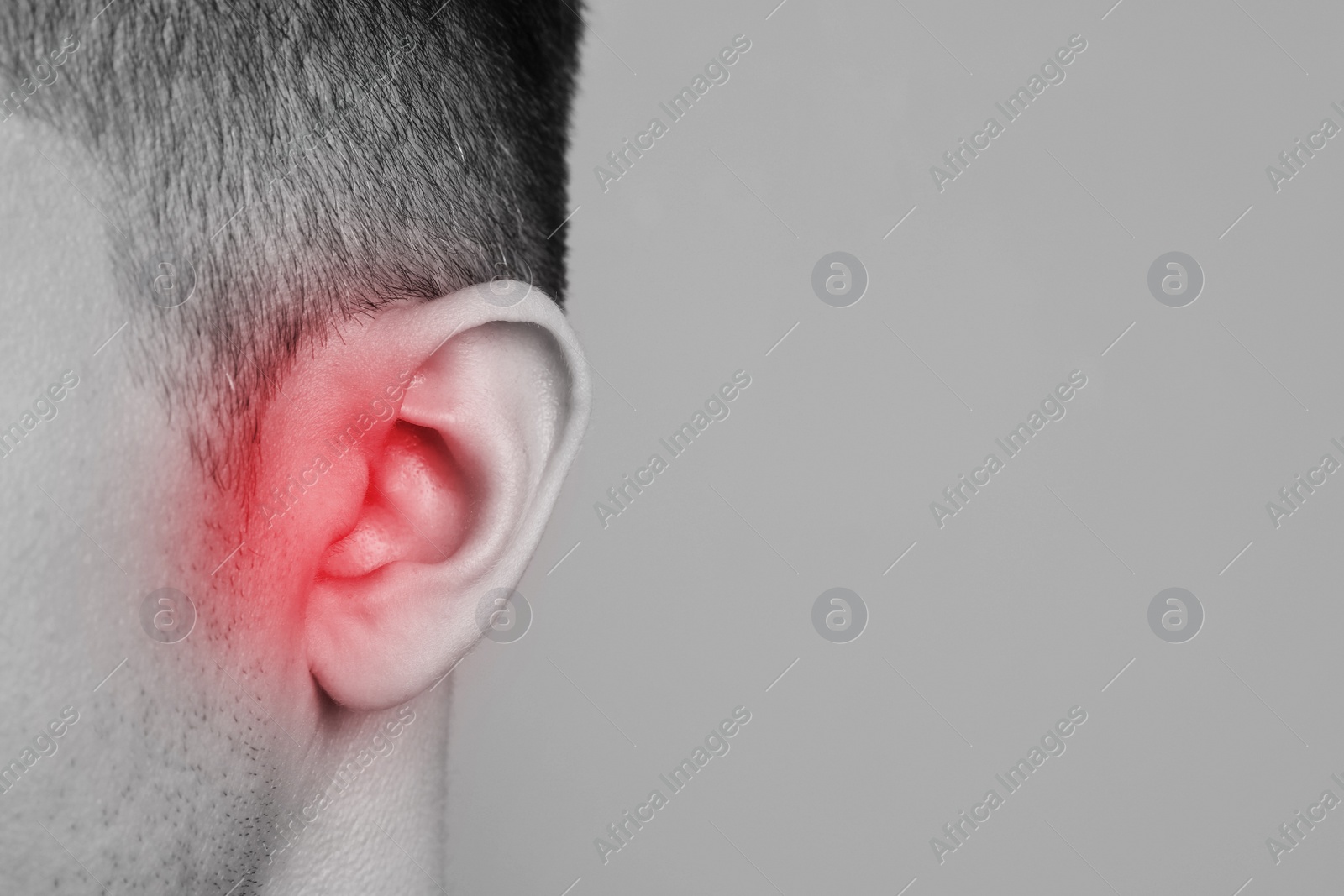 Image of Man with hearing problem, space for text. Black and white tone