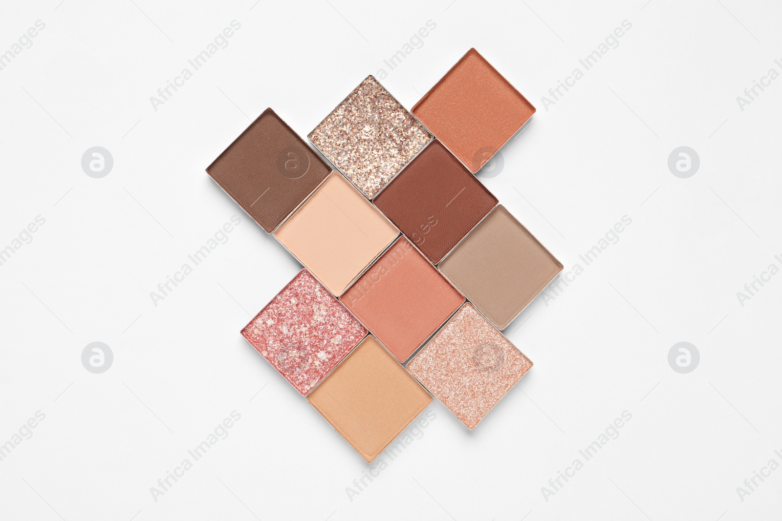 Photo of Different beautiful eye shadows on white background, flat lay