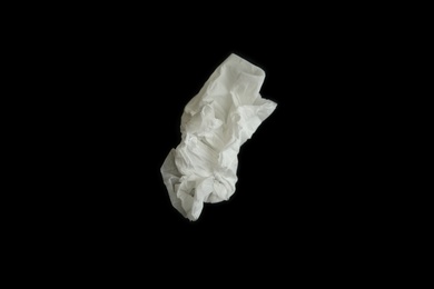 Photo of Used paper tissue on black background, top view