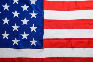 Photo of American flag as background, top view. National symbol of USA