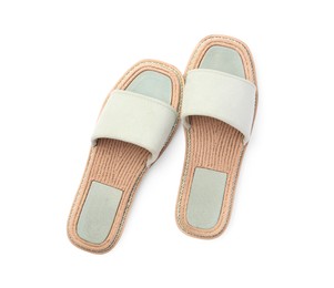 Photo of Stylish light grey slippers isolated on white, top view