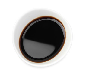 Photo of Tasty soy sauce in bowl isolated on white, top view