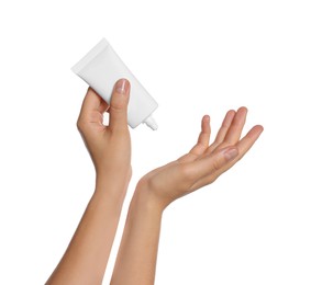 Photo of Woman applying cream on her hand against white background, closeup