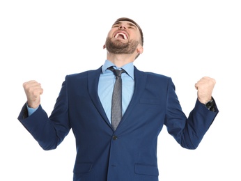 Photo of Young businessman celebrating victory on white background