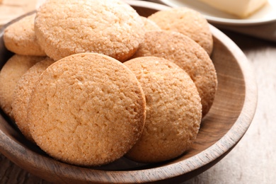 Photo of Bowl with Danish butter cookies on table, closeup