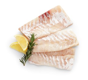 Photo of Fresh raw cod fillets with rosemary and lemon isolated on white, top view