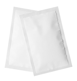 Photo of Two sachets isolated on white. Single use package