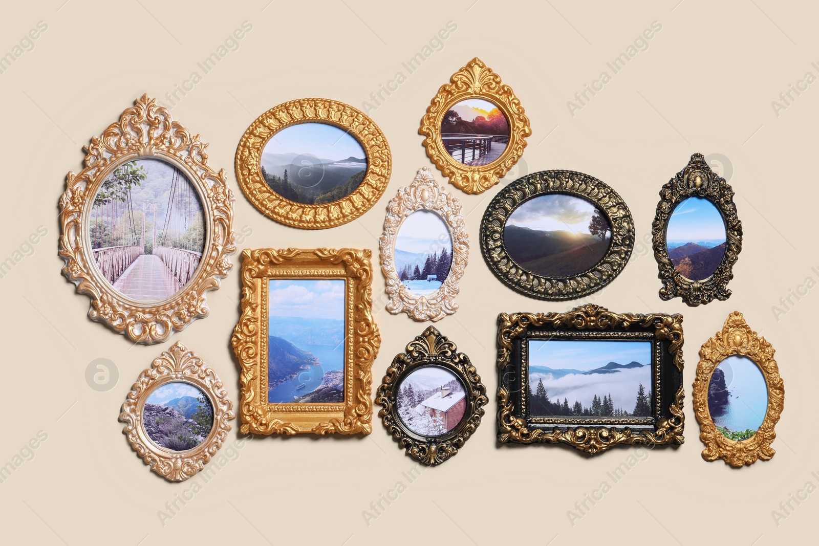 Photo of Vintage frames with photos of beautiful landscapes hanging on beige wall