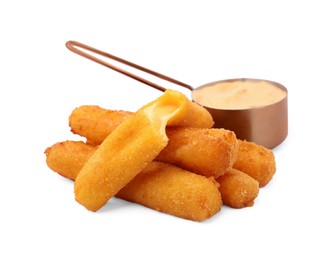 Photo of Tasty fried mozzarella sticks and sauce isolated on white
