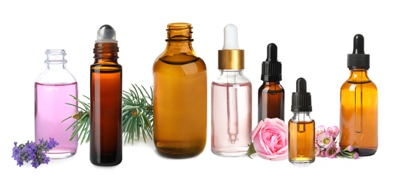 Image of Set of different essential oils used in aromatherapy on white background, banner design