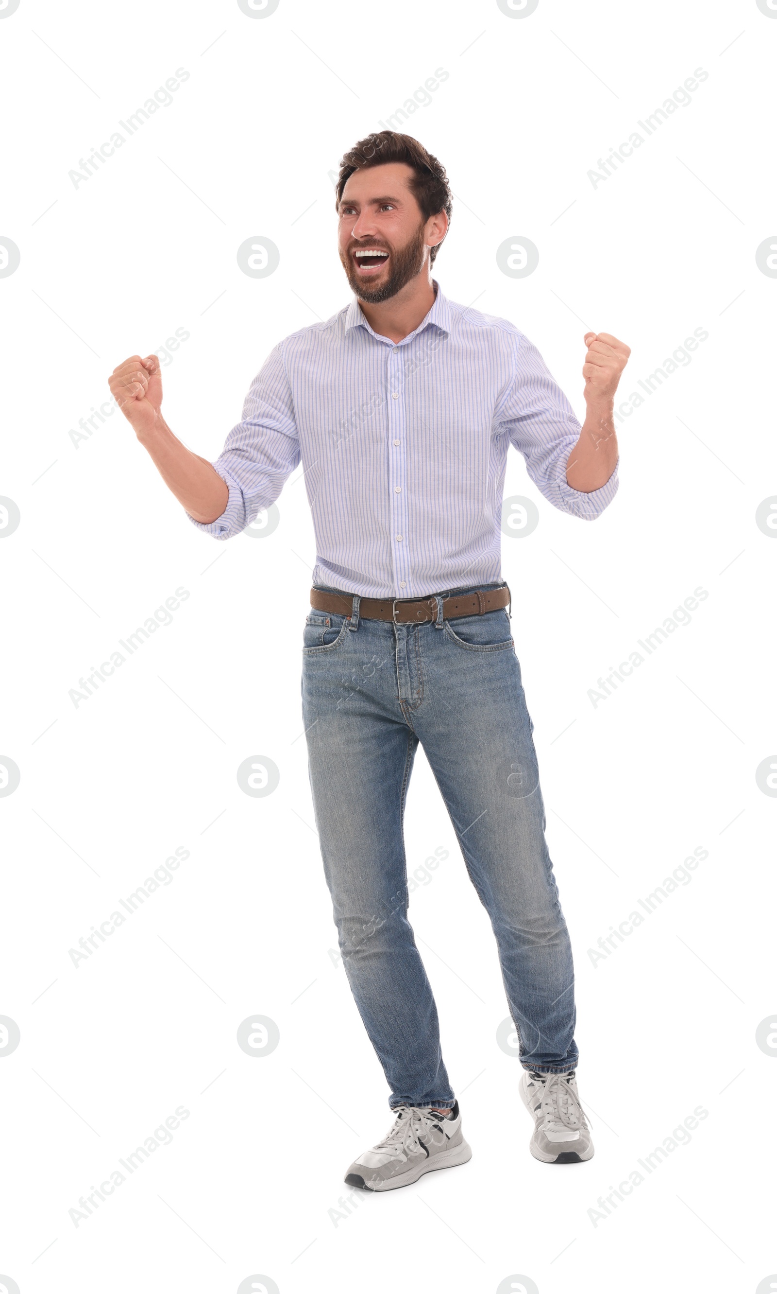 Photo of Emotional sports fan celebrating on white background