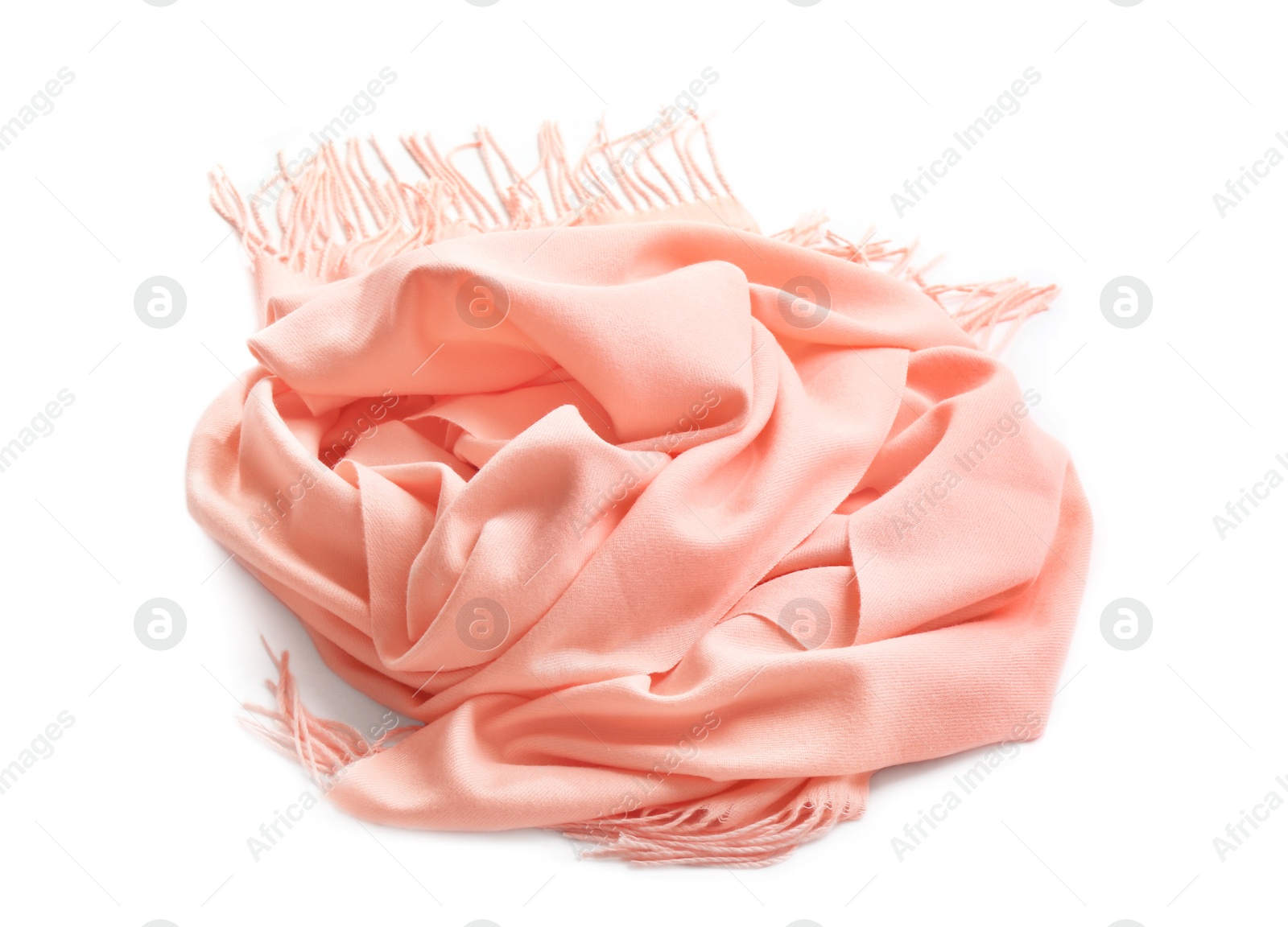 Photo of Peach scarf on white background. Autumn clothes