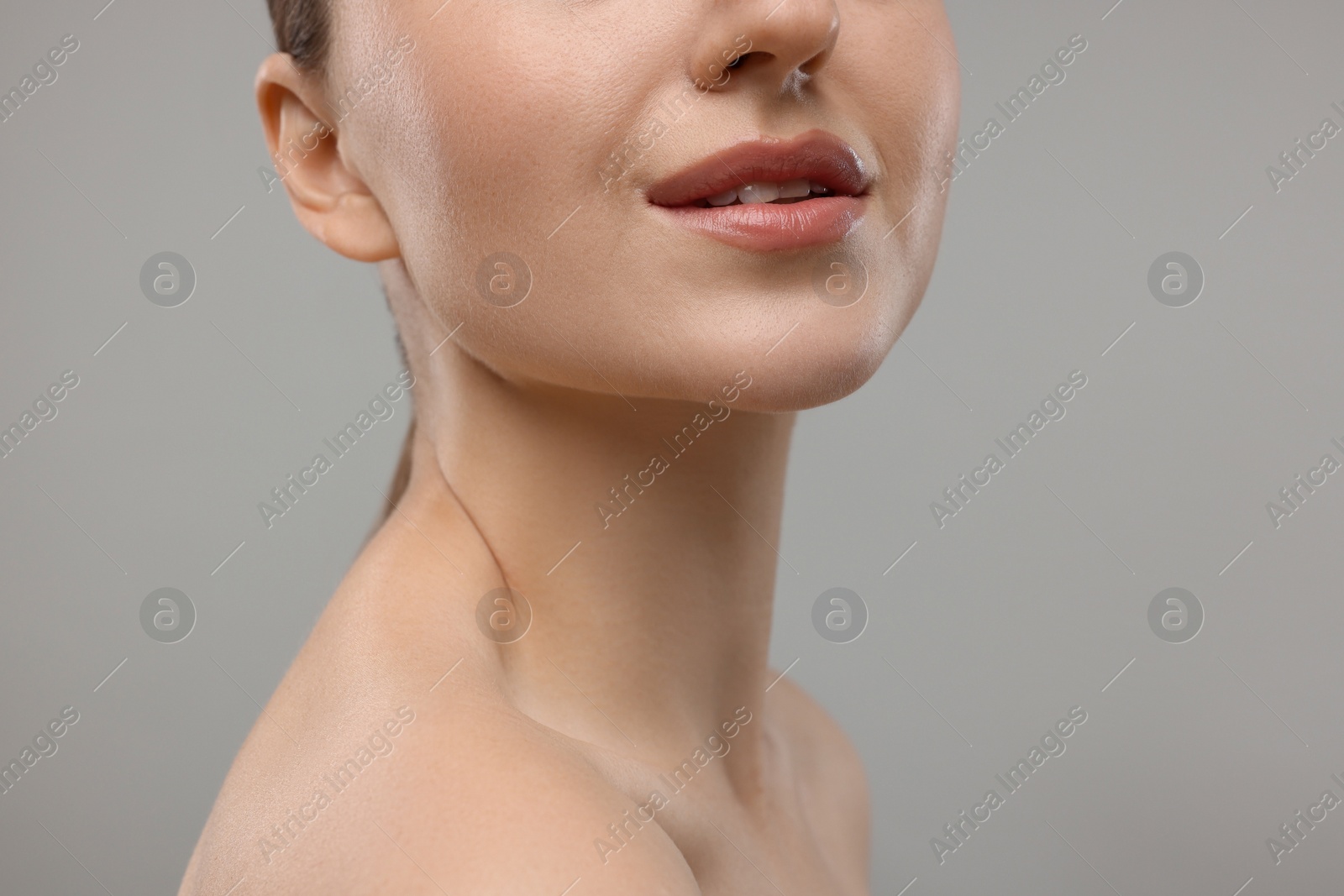 Photo of Beauty concept. Woman on grey background, closeup