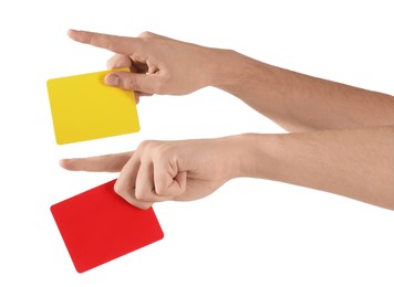 Referee holding cards and pointing on white background, closeup