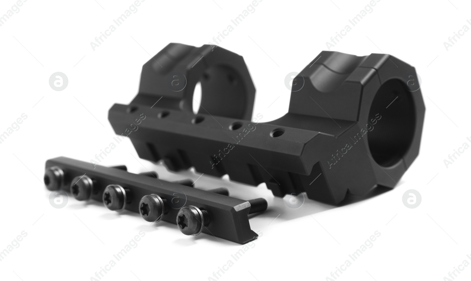 Photo of Disassembled quick disconnect sniper cantilever scope mount on white background