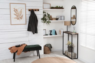 Photo of Hallway interior with console table and stylish decor