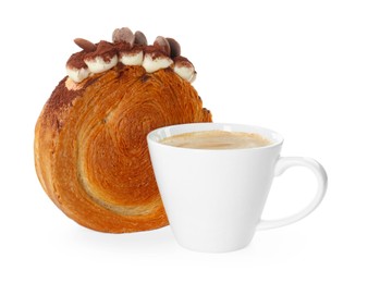 Photo of Round croissant with chocolate chips and cup of coffee isolated on white. Tasty puff pastry