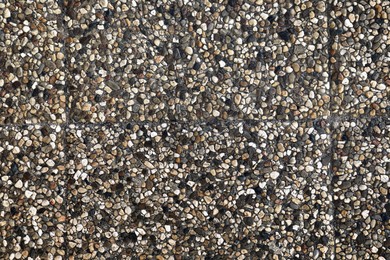 Photo of Texture of grey stone surface as background, top view