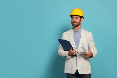 Photo of Professional engineer in hard hat with clipboard and draft on light blue background, space for text