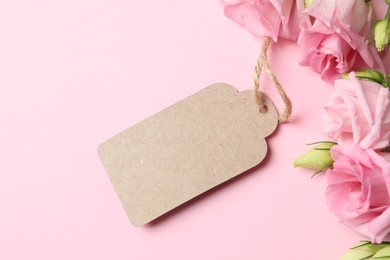 Happy Mother's Day. Beautiful flowers and blank card on pink background, flat lay