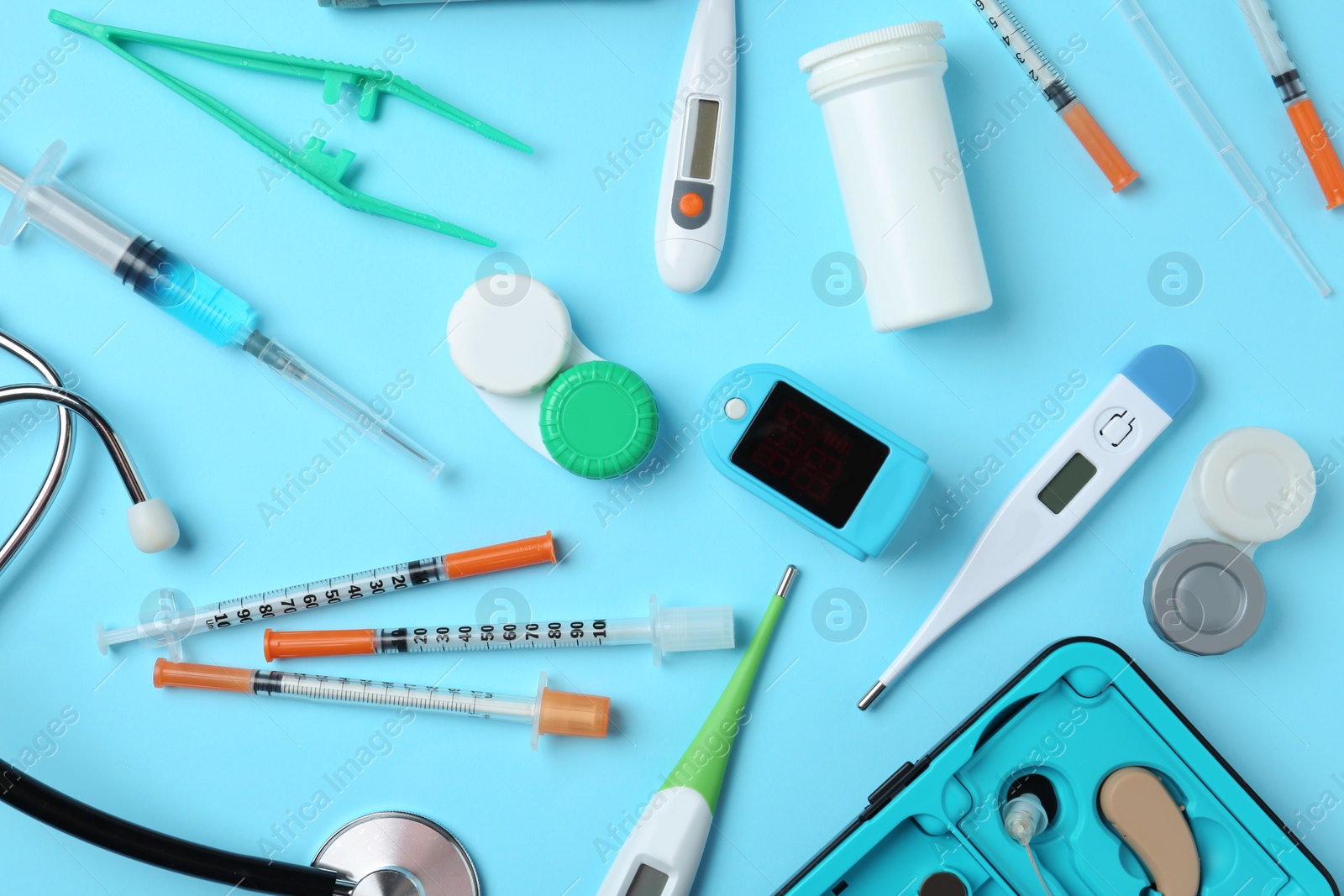 Photo of Flat lay composition with different medical objects on color background