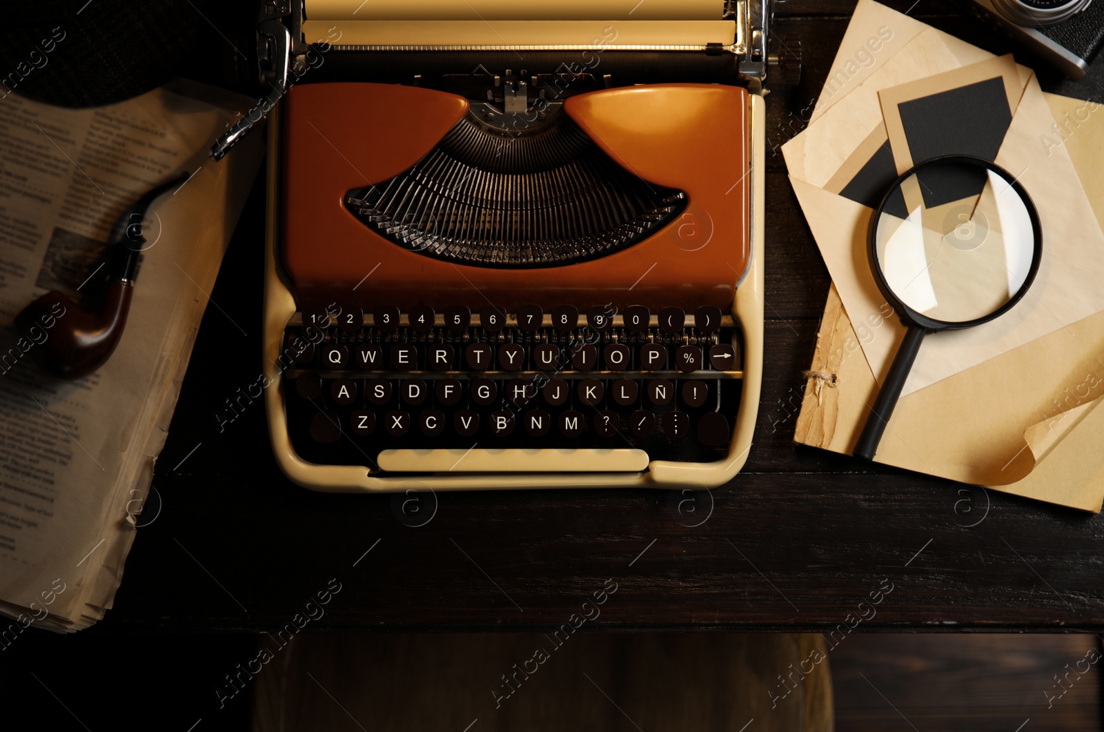 Photo of Flat lay composition with vintage detective items on dark wooden background