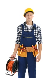 Electrician with extension cord reel and tools  wearing uniform on white background