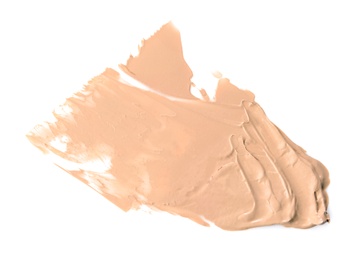 Sample of liquid foundation foundation on white background, top view