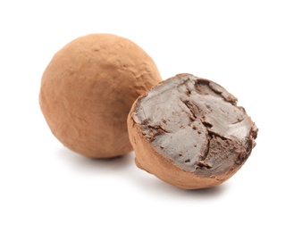 Photo of Delicious raw chocolate truffles on white background