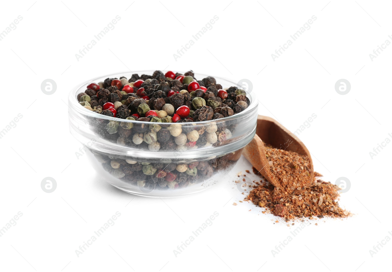 Photo of Ground pepper and corns isolated on white