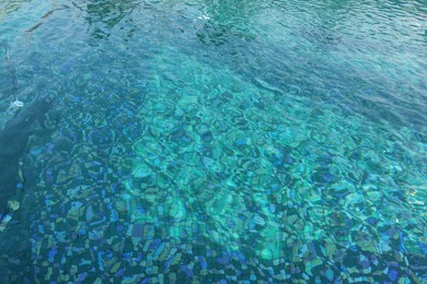 Photo of Clear rippled water in swimming pool outdoors