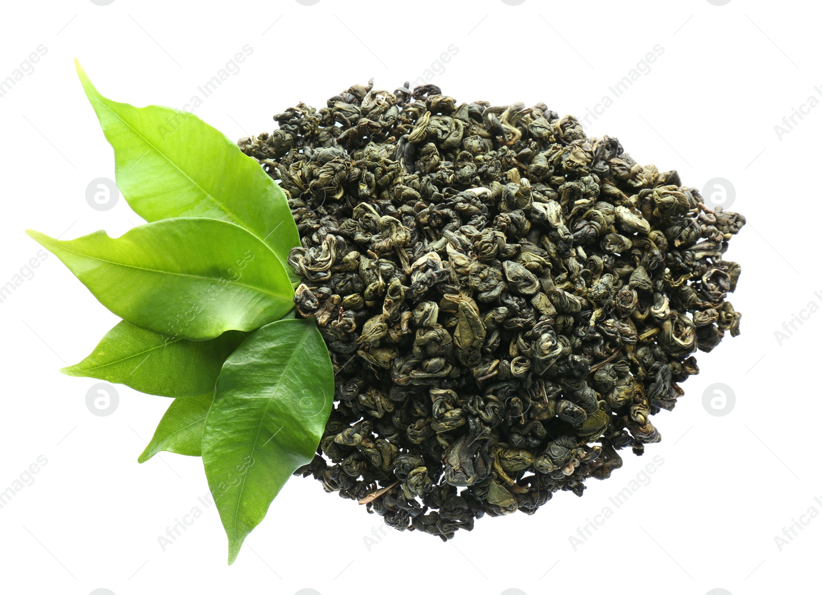 Photo of Pile of dried green tea leaves on white background, top view