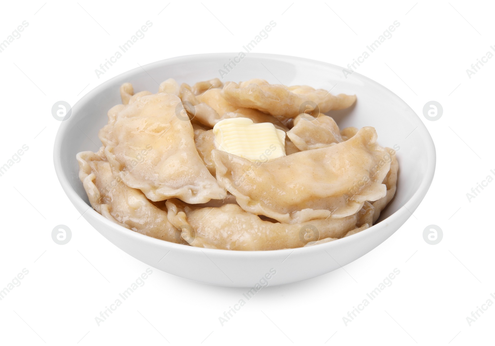 Photo of Bowl of delicious dumplings (varenyky) with cottage cheese and butter isolated on white