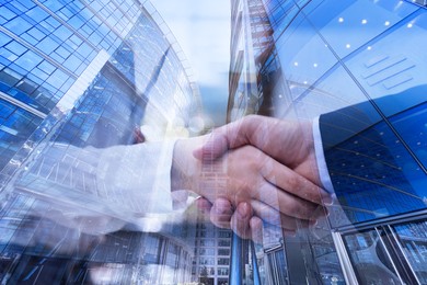 Image of Partnership, cooperation, collaboration. Double exposure of buildings and people shaking hands